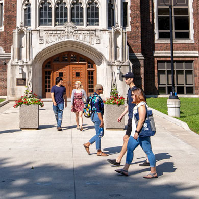 Students walking in front of Dillon Hall